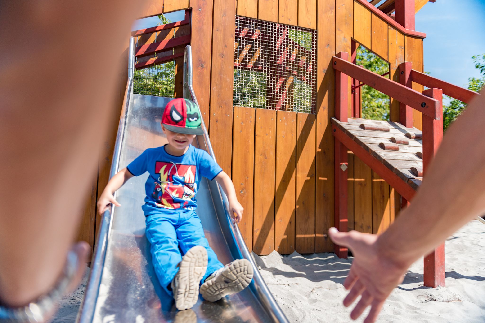 Children playing on the playground outside the MNM